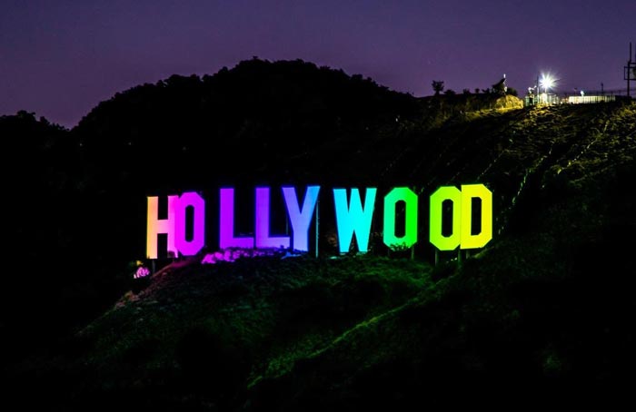 Hollywood-sign-in-pride-colours-at-night Hollywood-sign-in-pride-colours-at-night